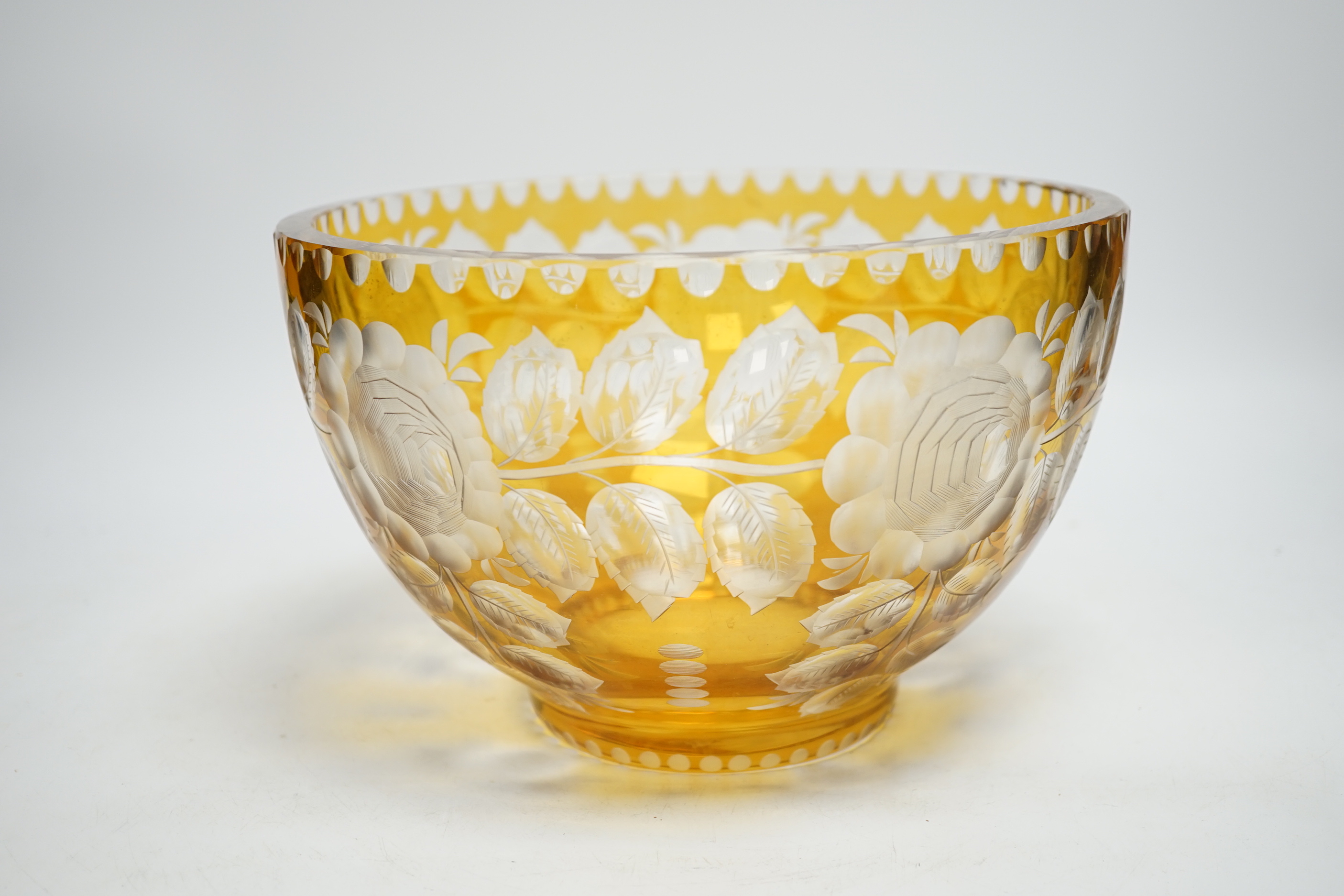 A Bohemian yellow overlaid glass bowl, 24cm diameter